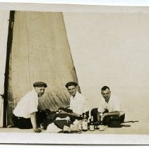 Dock Picnic with Sail Boat
